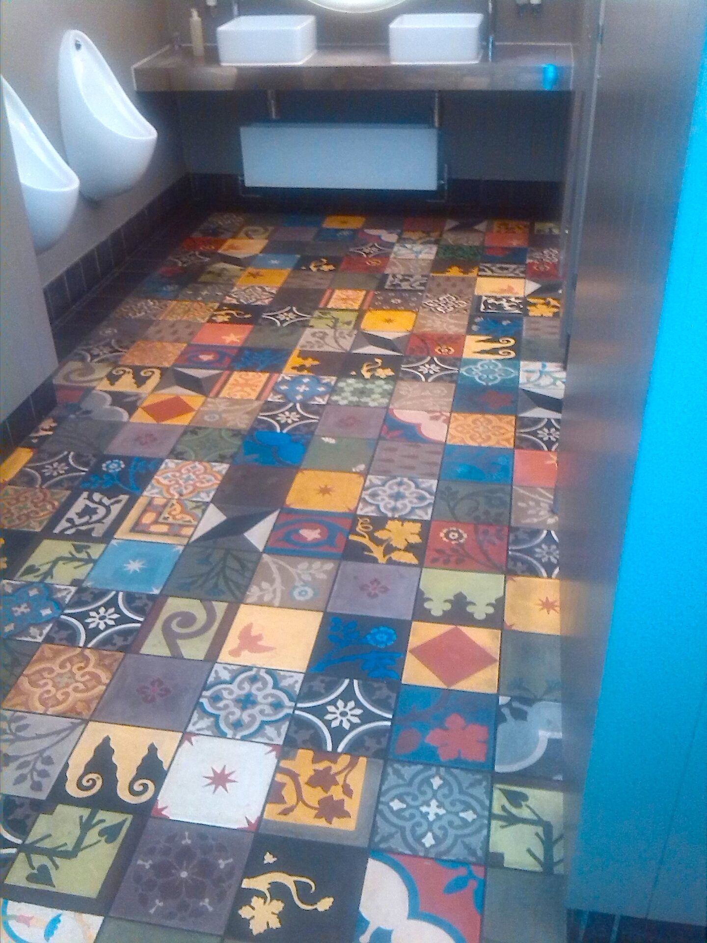 Restaurant Floor Designed With Tile Murals